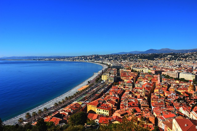 Nice Promenade Des Anglais Beach Scene With Tourists