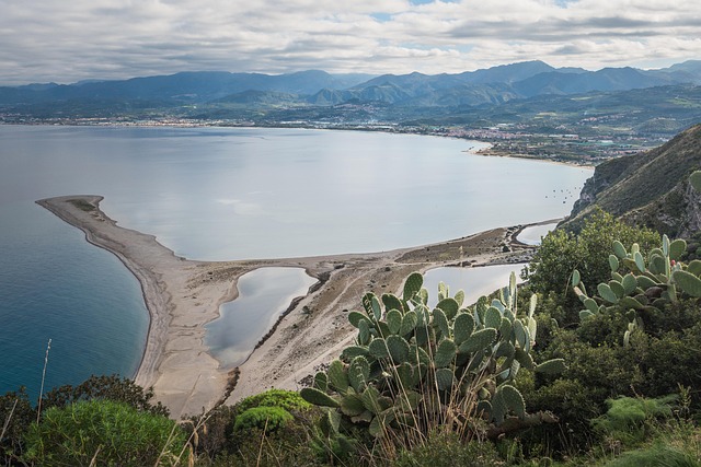 Sicily Island Landscape With Mount Etna, Ancient Greek Ruins, Sandy Beaches, Rocky Coves, And Citrus Orchards