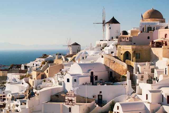 Santorini Whitewashed Buildings Blue Domes Aegean Sea Cliffs
