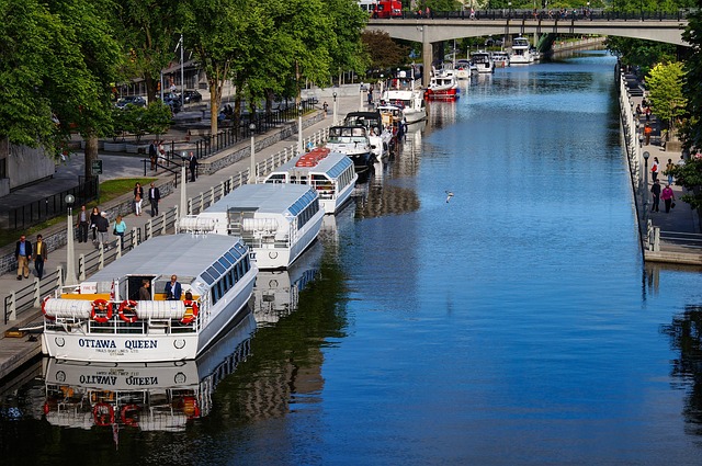 Ottawa Cityscape With Rideau Canal In Winter And ByWard Market Bustling With People