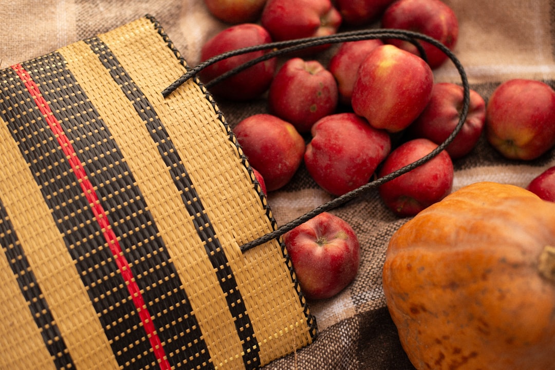 Autumn Harvest Charcuterie Board With Figs, Pear Slices, Pumpkin Seeds, Pecans, Aged Cheddar, Smoked Gouda, Cranberry Sauce, Apple