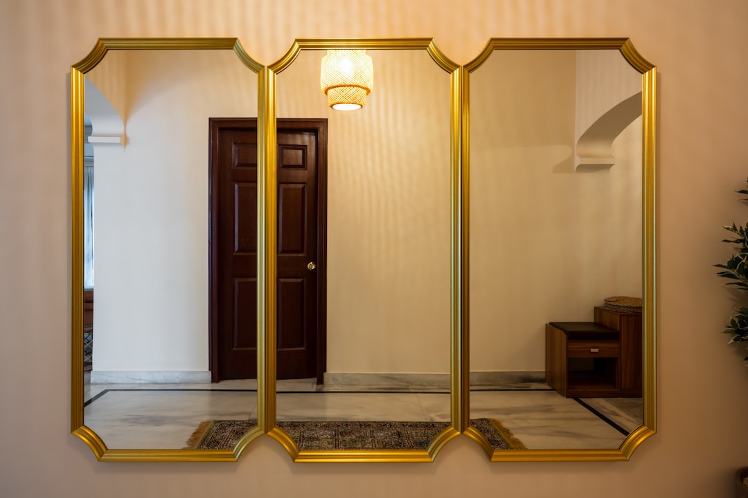 Two Mirrors Facing Each Other In A Hallway