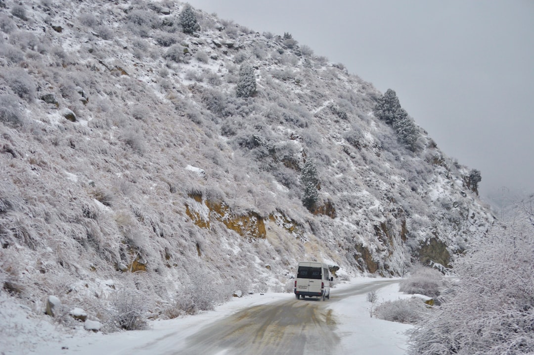 Zoji La Pass Mountain Road In Heavy Snowfall With Trucks And Livestock