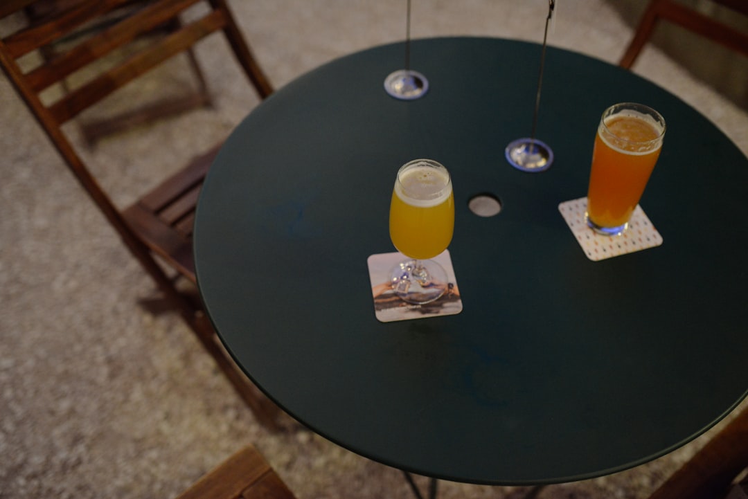 Two Options Presented On A Table With A Person Contemplating Their Choice