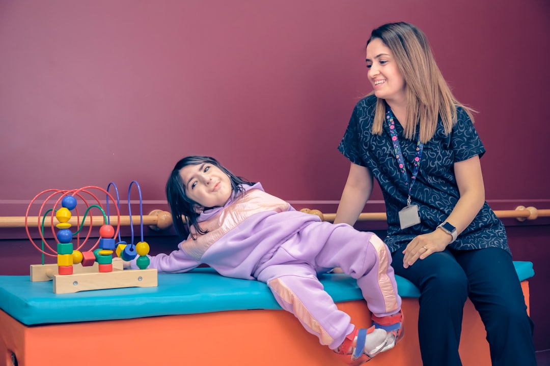 LGBTQ+ Affirming Childcare Setting With Caregivers Interacting With Children