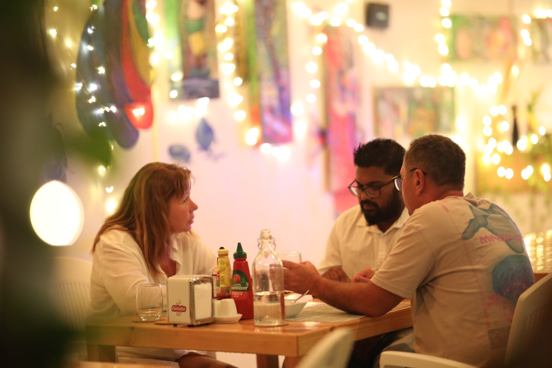 Couple Dining At A Restaurant, One Person Ordering Food For The Other Without Asking For Their Input