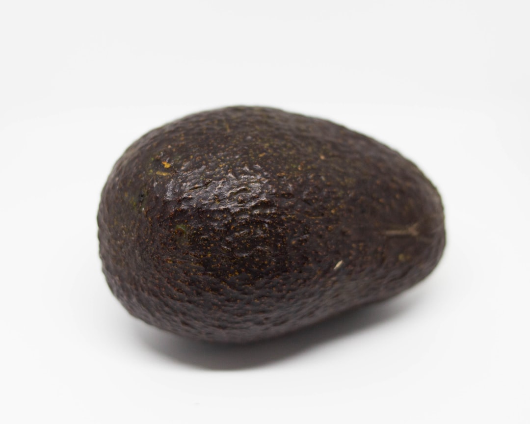 Ripe Avocado With Dark Skin Color