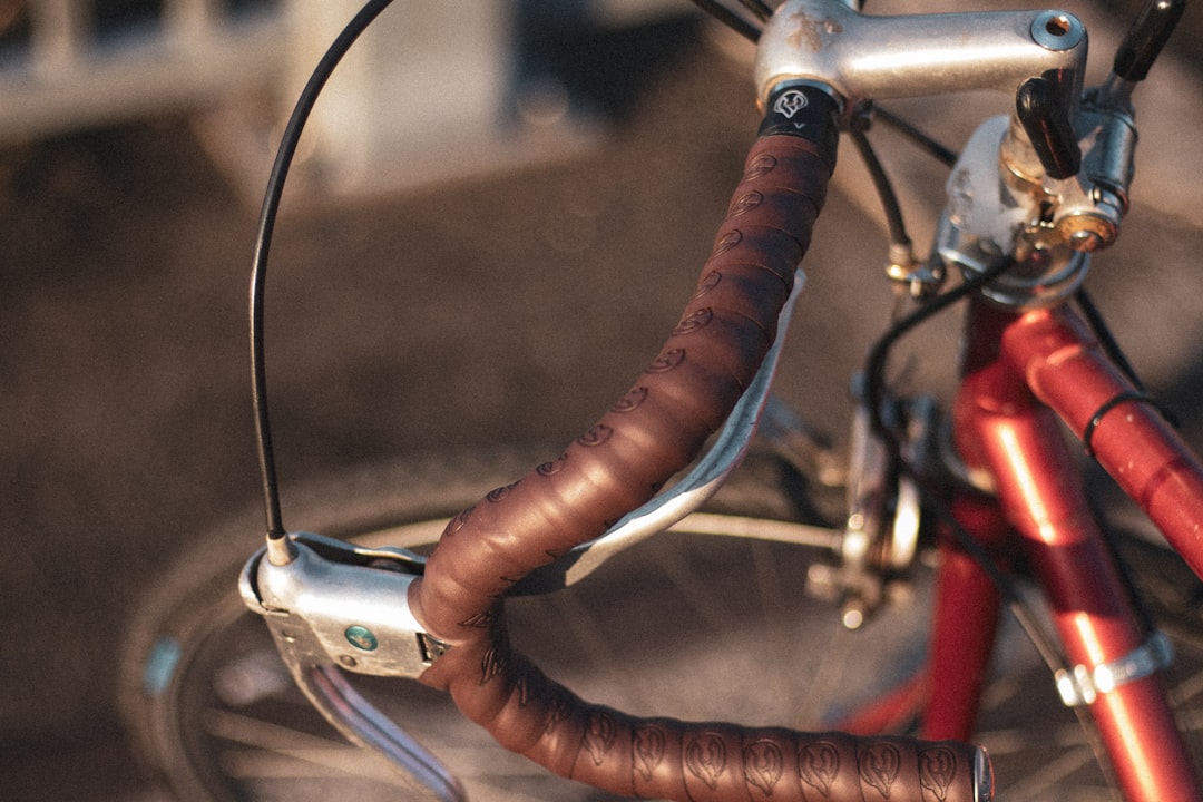 Leather Handlebar Grips On A Bicycle With Natural Stitching Details
