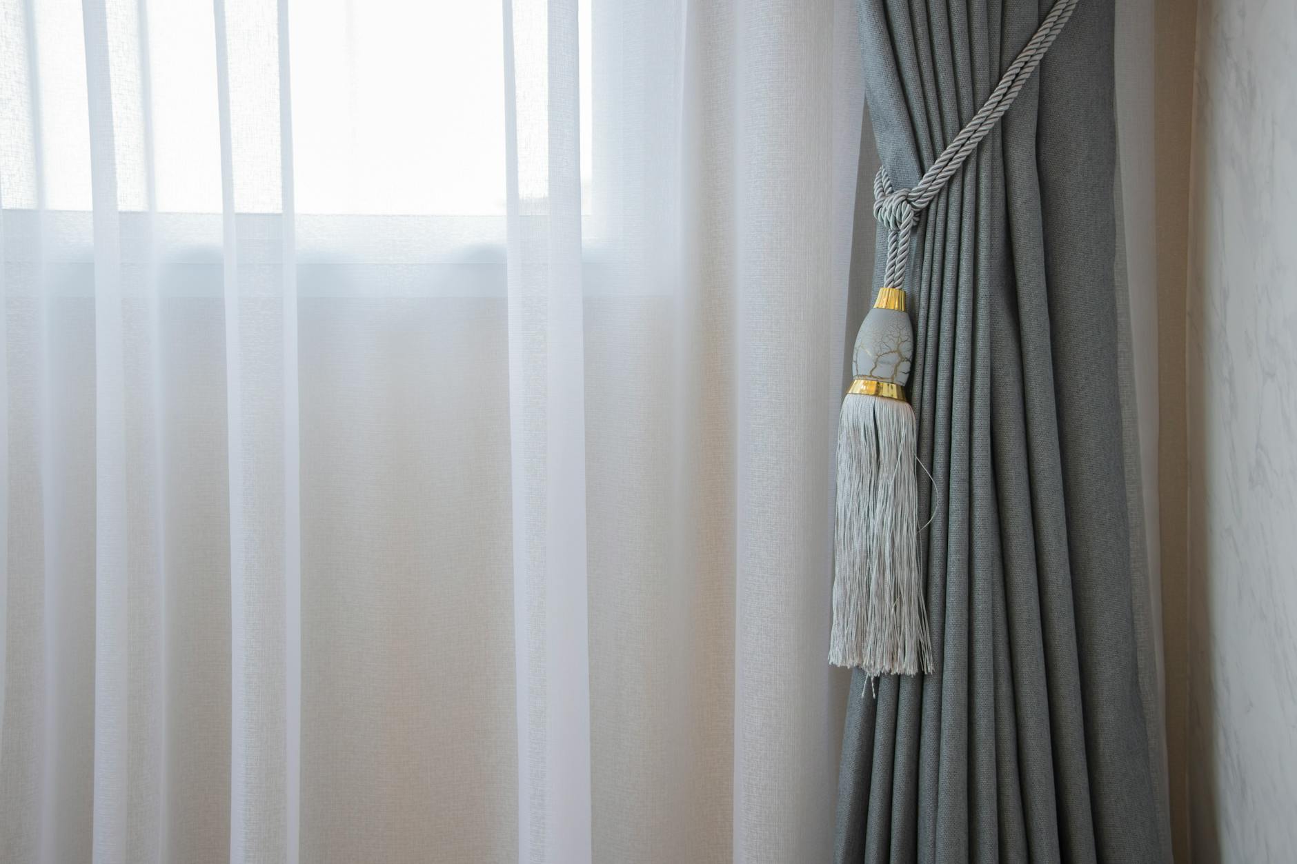 Lightweight Sheer Curtain Fabrics In A Bright Bedroom With Natural Light Filtering Through The Windows