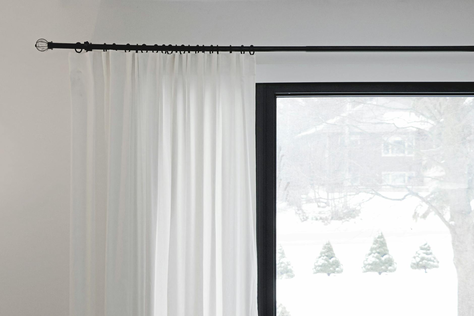 Curtain Rod Mounted At Ceiling With Long Curtains