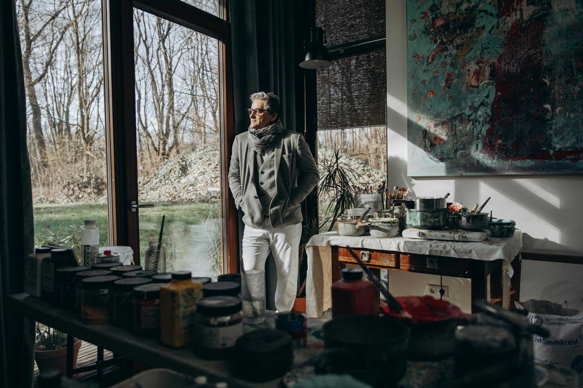 Person Painting In A Cozy Studio