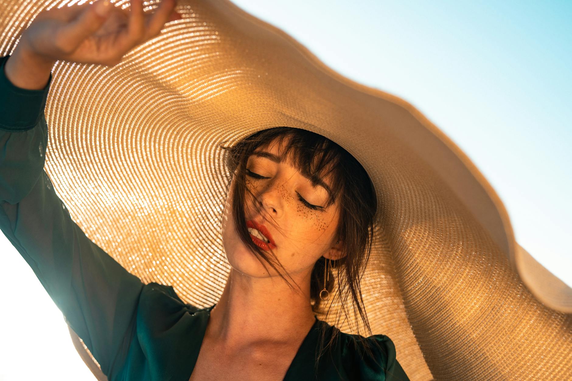 Floppy Sun Hat On A Model With A Square Face, Outdoors, Soft Lighting, Casual Setting