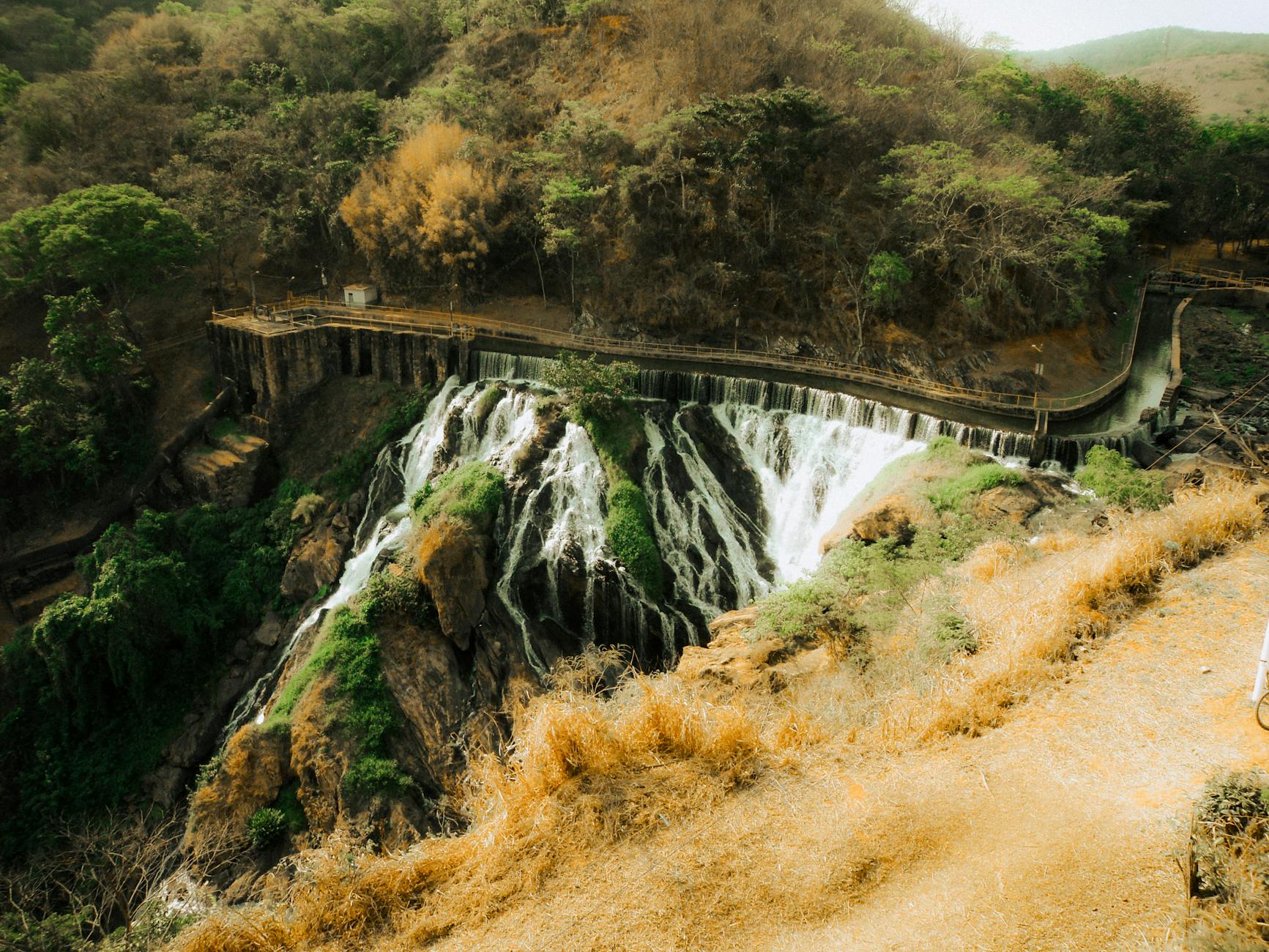Dudhsagar Falls Goa Lush Green Cliff Pouring Water