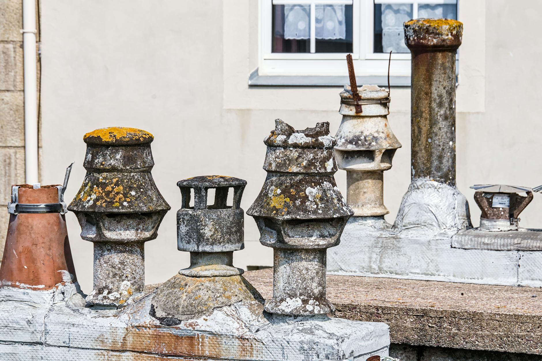 Damaged flashing around chimneys and vents