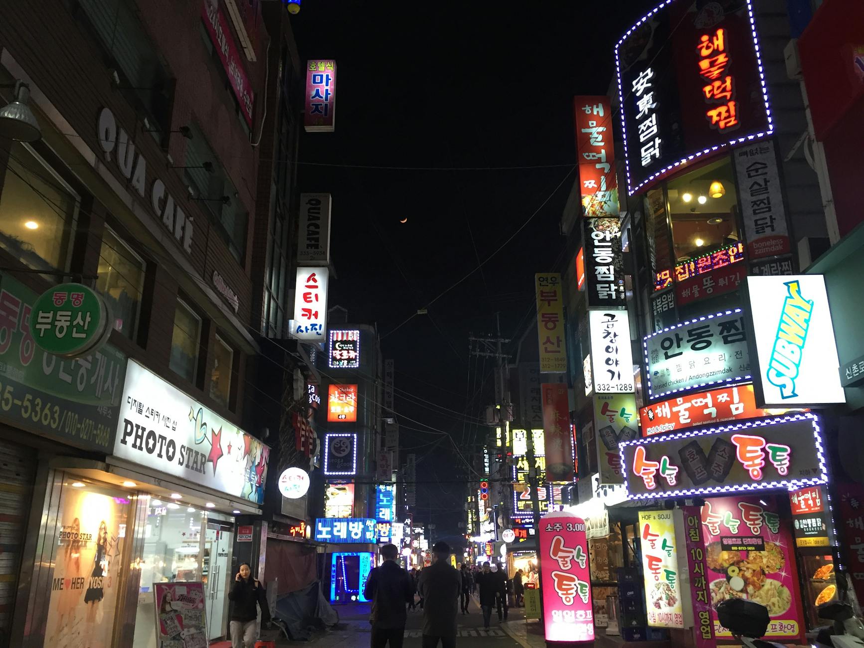 Seoul City Streets At Night With Cafes And Restaurants, Well-lit And Safe For Solo Female Travelers