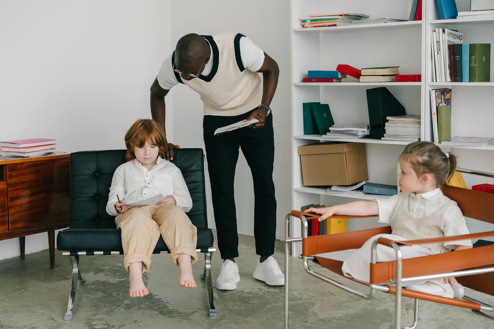 Therapist Office With A Parent And Child In A Supportive Environment