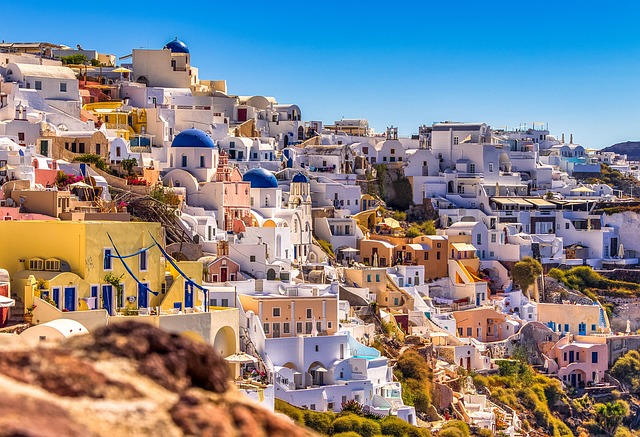 Santorini Whitewashed Buildings Blue-domed Churches Sunset