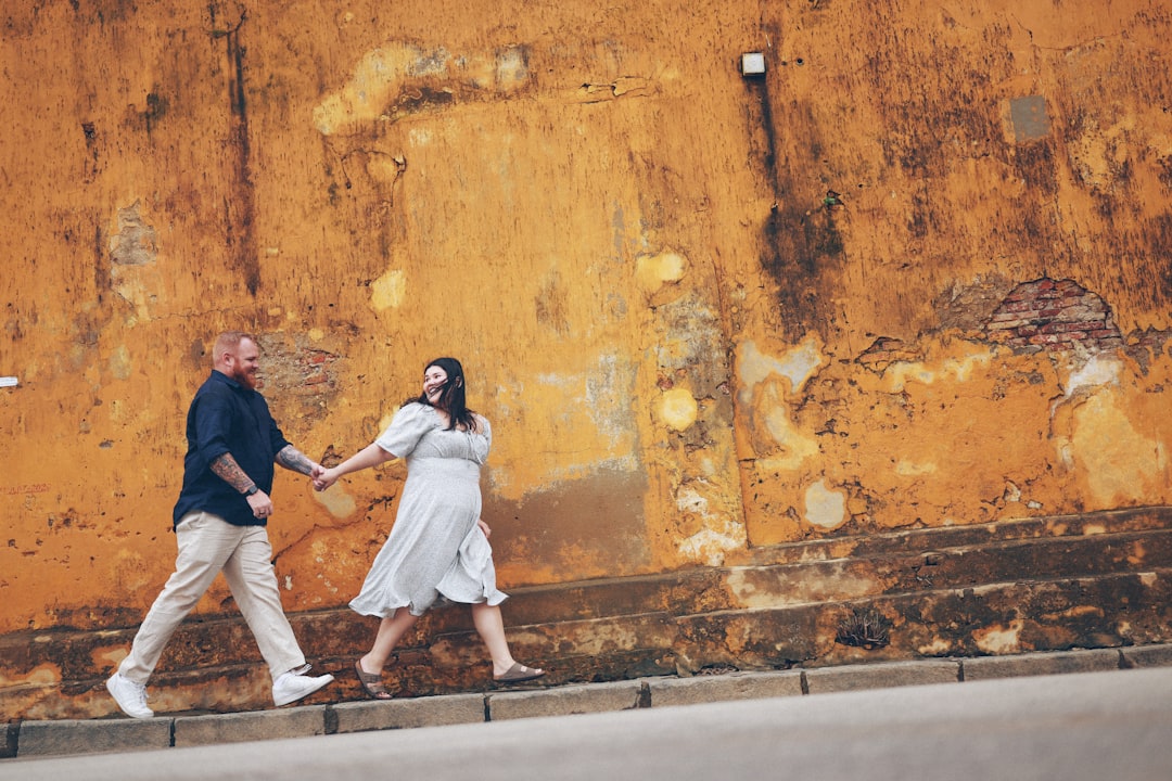 Couple Holding Hands Walking