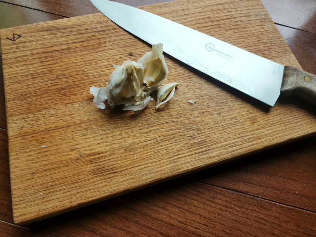 Fresh Garlic Cloves On A Cutting Board