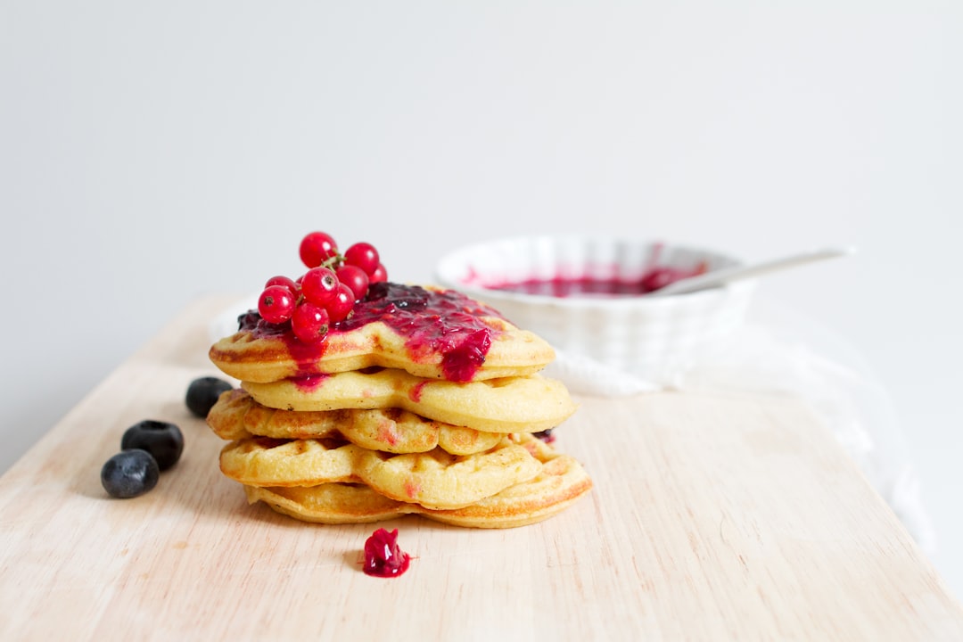 Gluten-free Banana Oat Pancakes With Berries And Maple Syrup