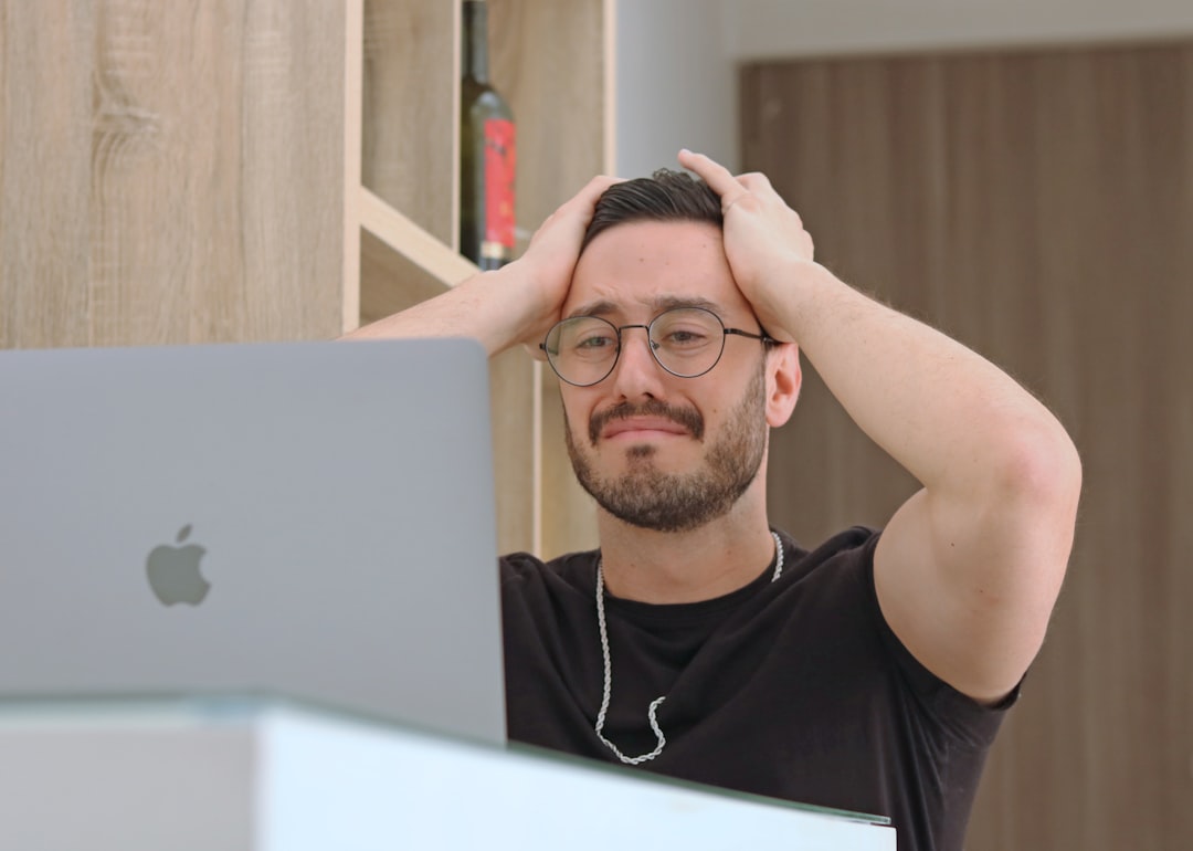 Man Experiencing Mood Swings At Work