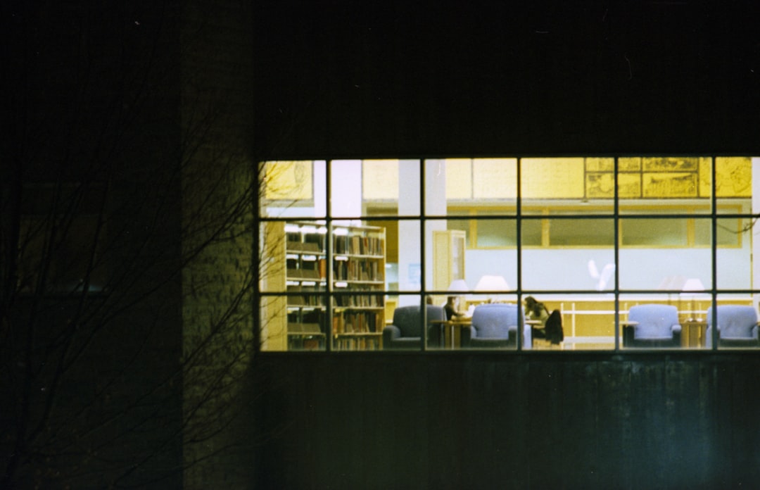 Person Reading A Book In A Cozy Setting