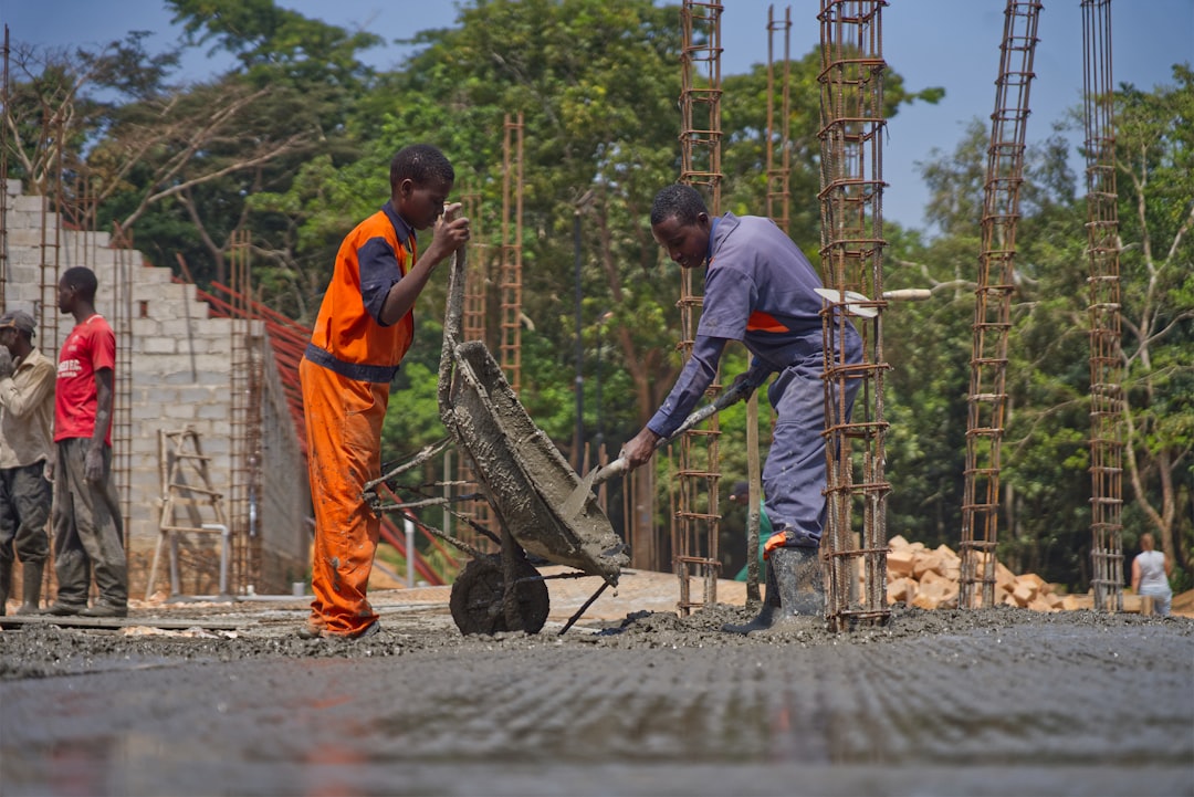 Workers Pouring Cement