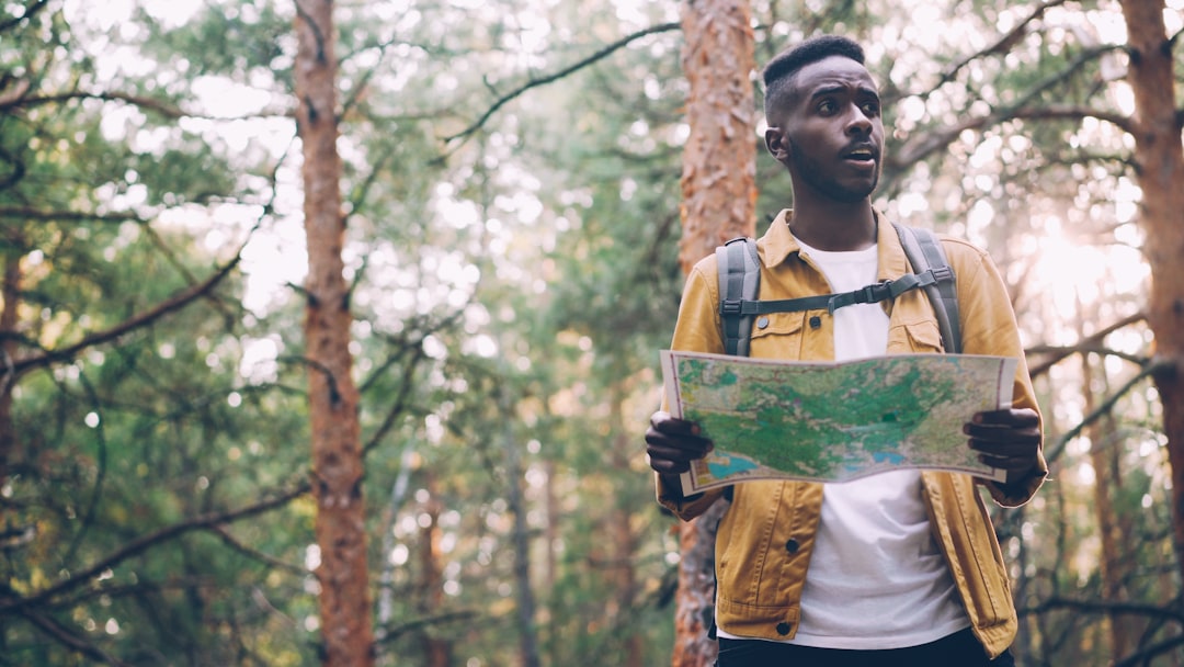 Young Person Looking At A Map