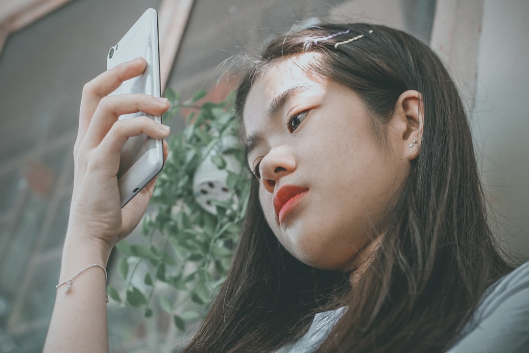 Disappointed Person Looking At Phone