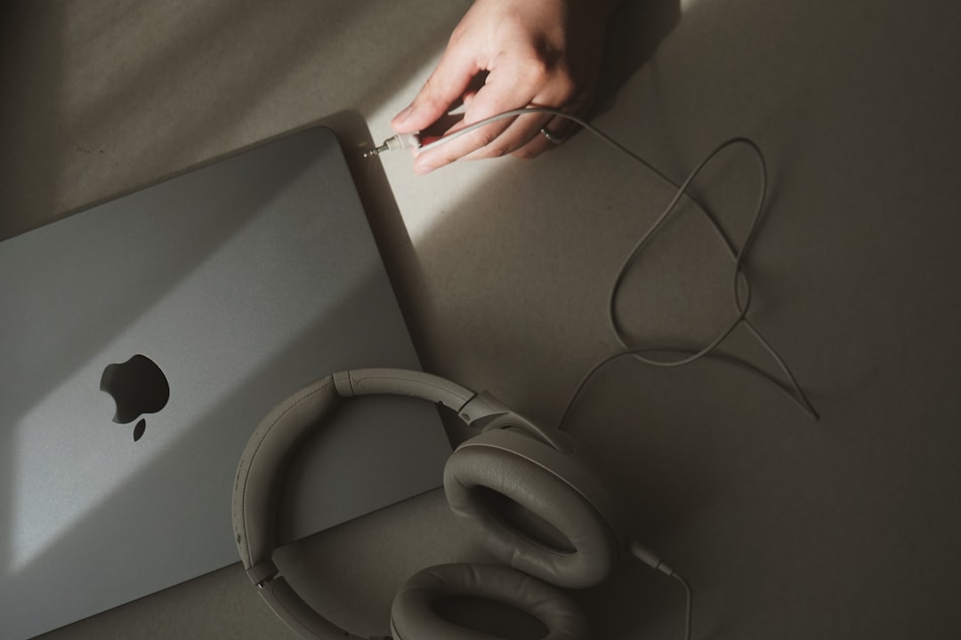 Earphones And Notebook