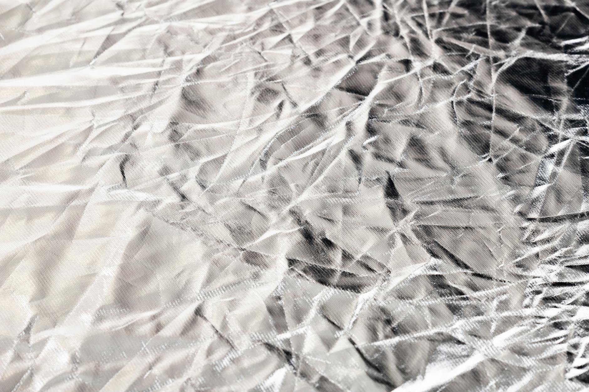 homemade reflector made from aluminum foil and cardboard