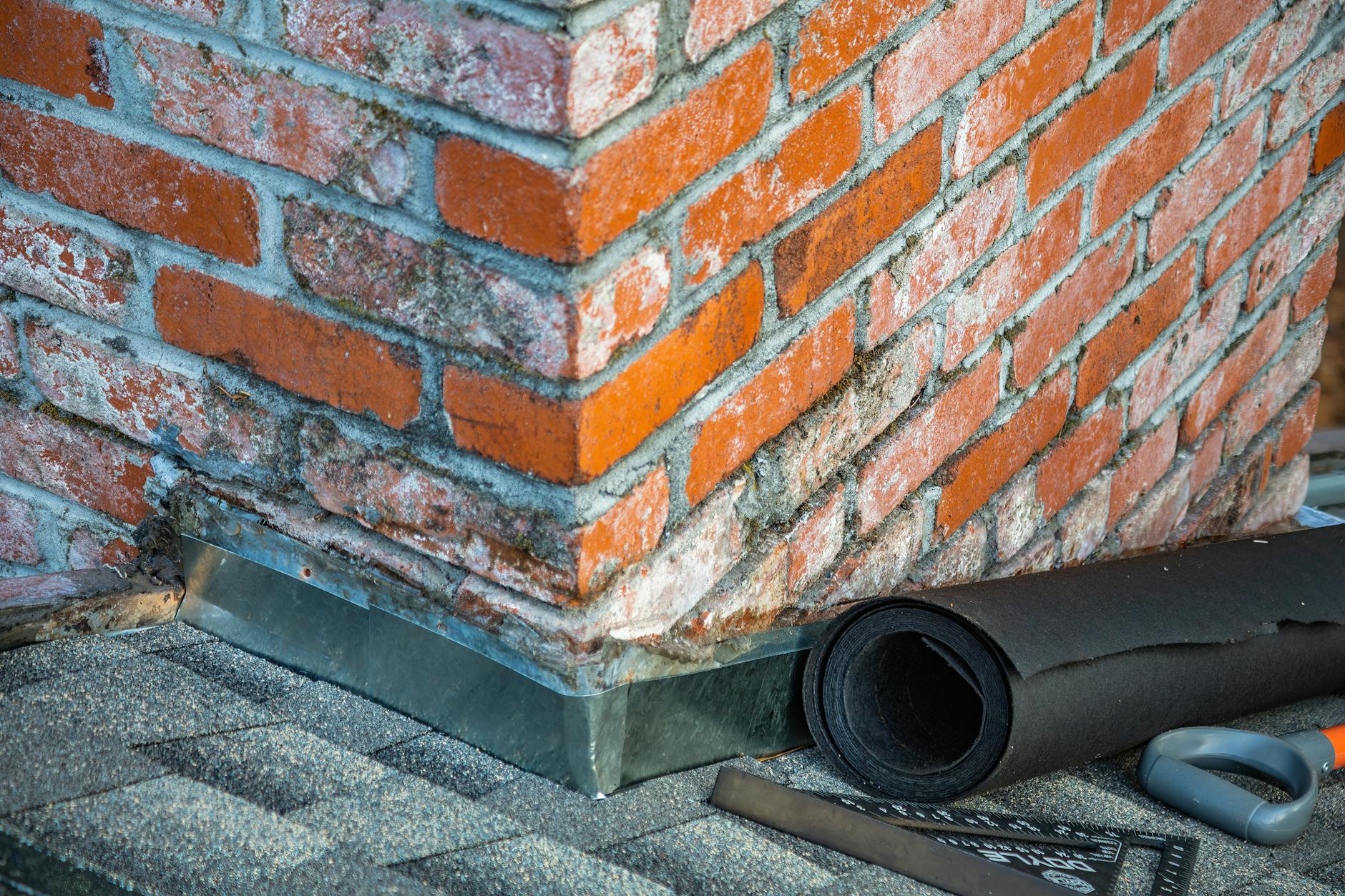 Masonry Worker Repairing Chimney
