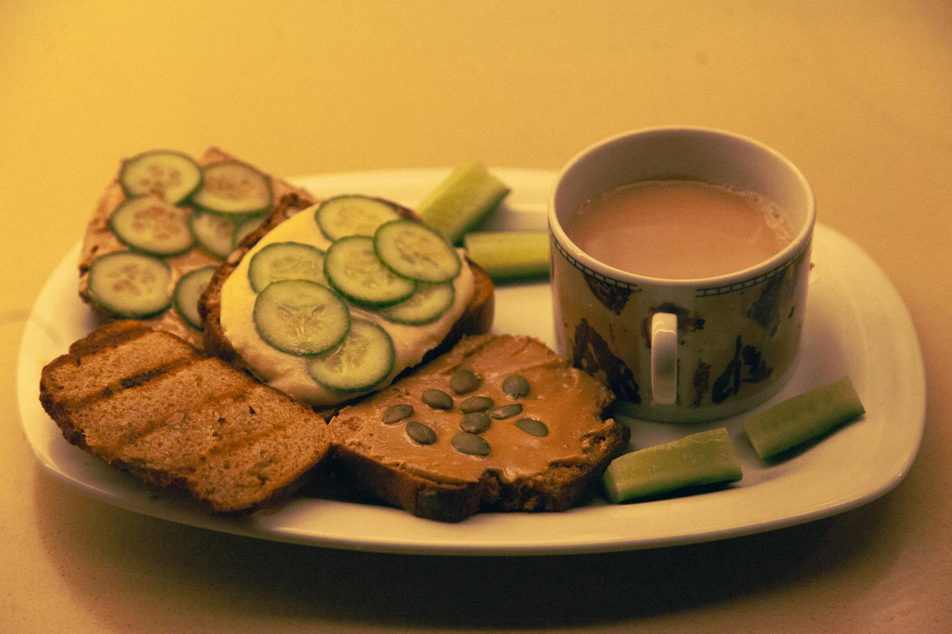 Hummus Toast With Cucumber Slices And Zaatar On Sourdough