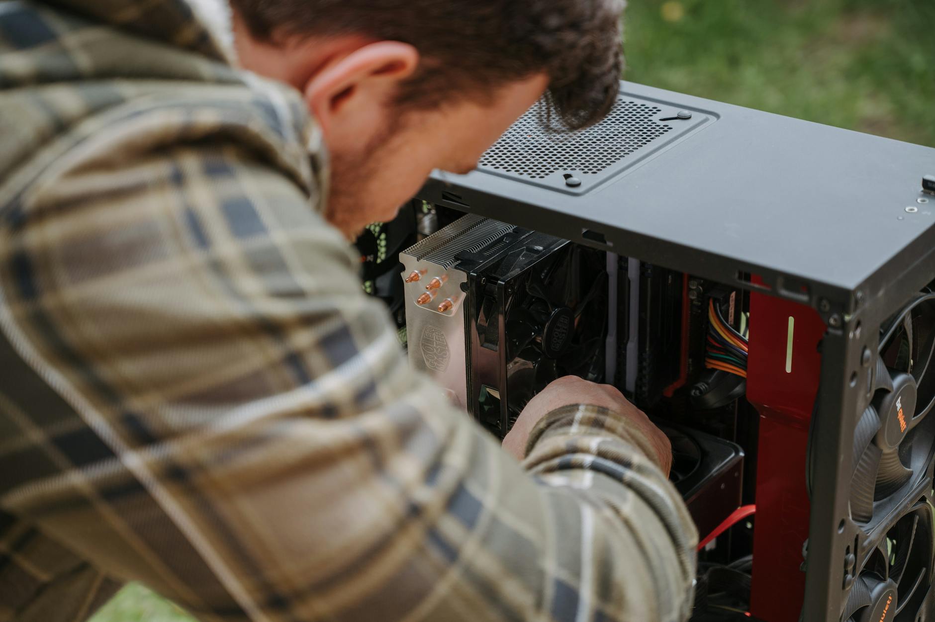 Person Cleaning Computer