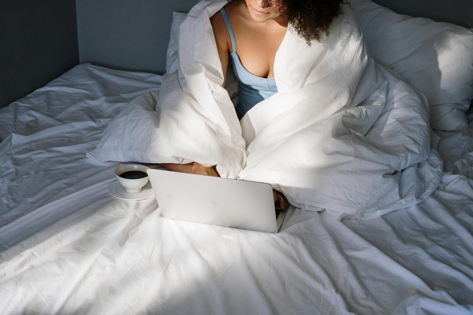 Laptop On Bed