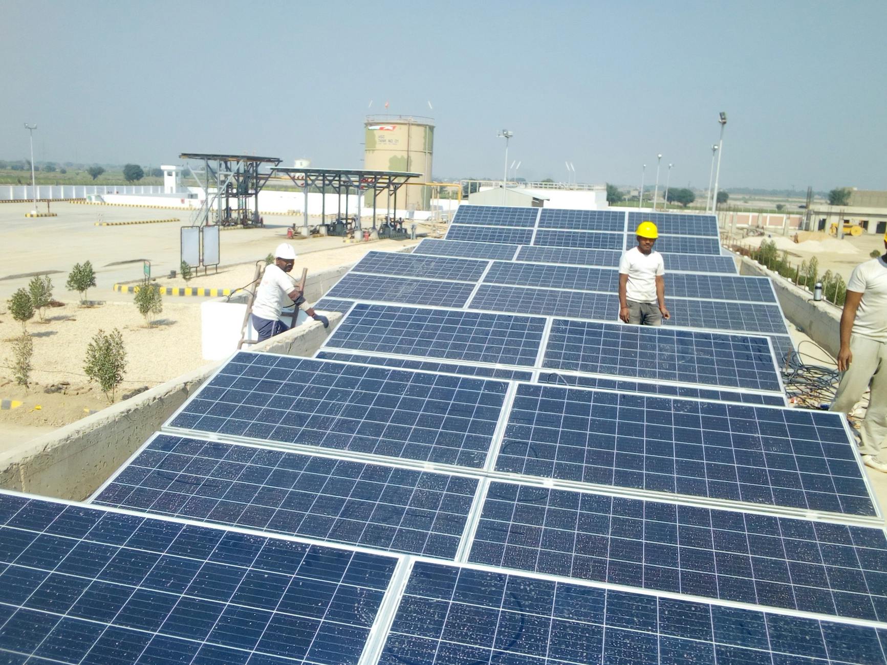 Worker Installing Solar Panels