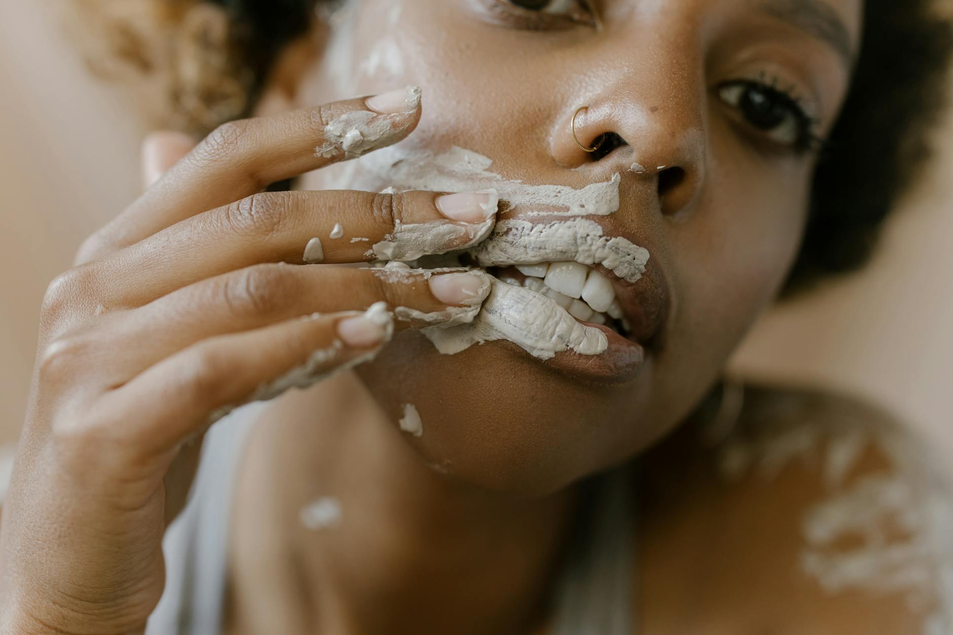 Black Woman Applying Clay Mask Skincare