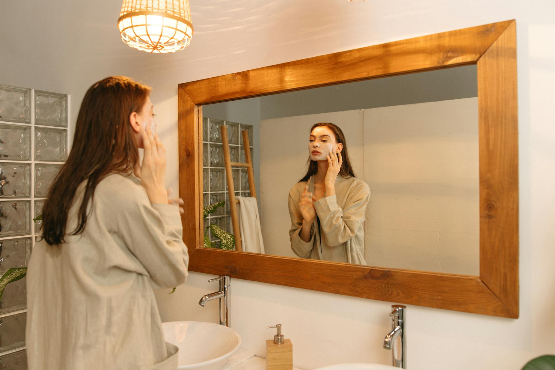 Woman Applying Cleanser