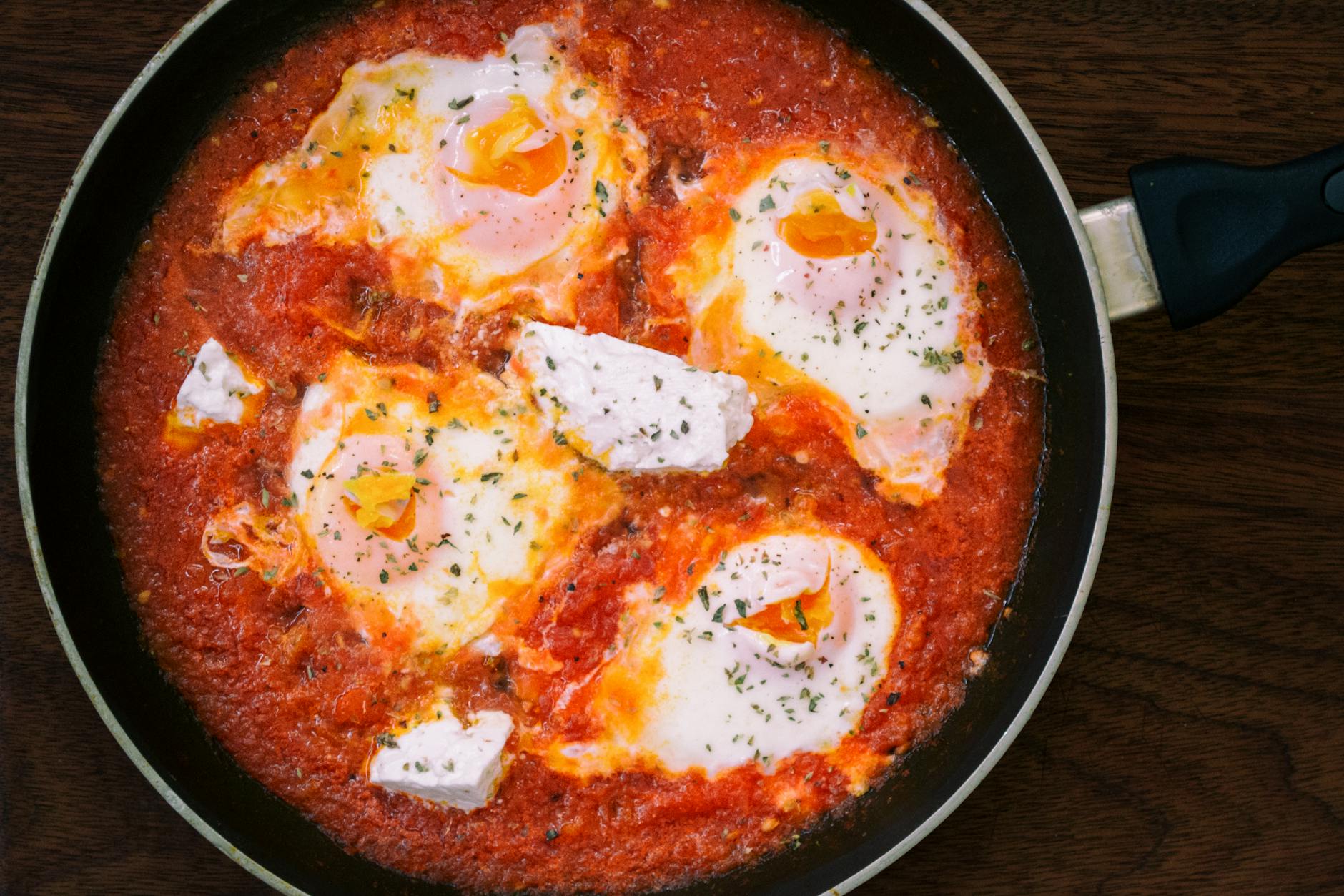 Shakshuka With Poached Eggs In Tomato Sauce