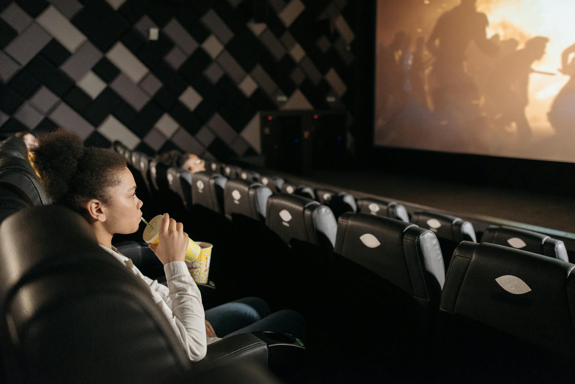 Person Watching Movie Alone In Cinema
