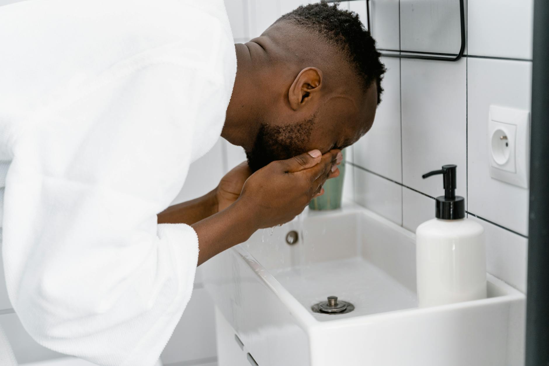 Person Washing Face Gently