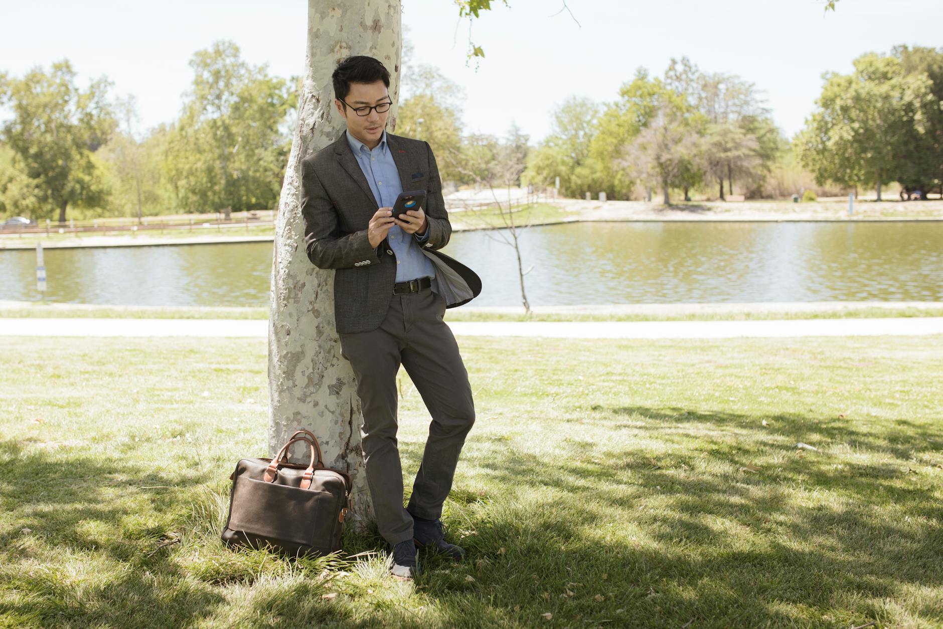 Person Standing Under Tree Shade