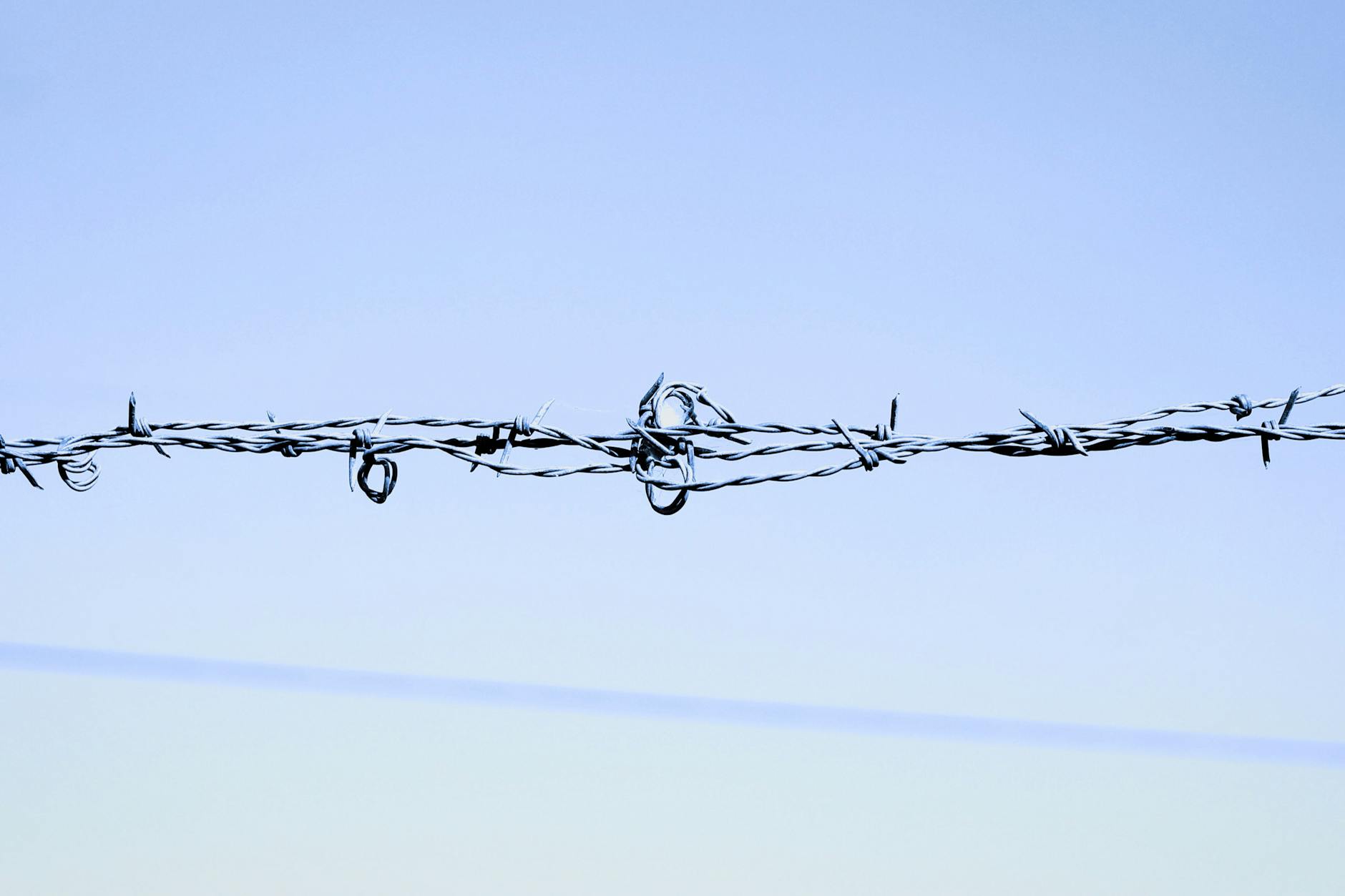 Person Placing Barrier Objects Between Themselves And Another