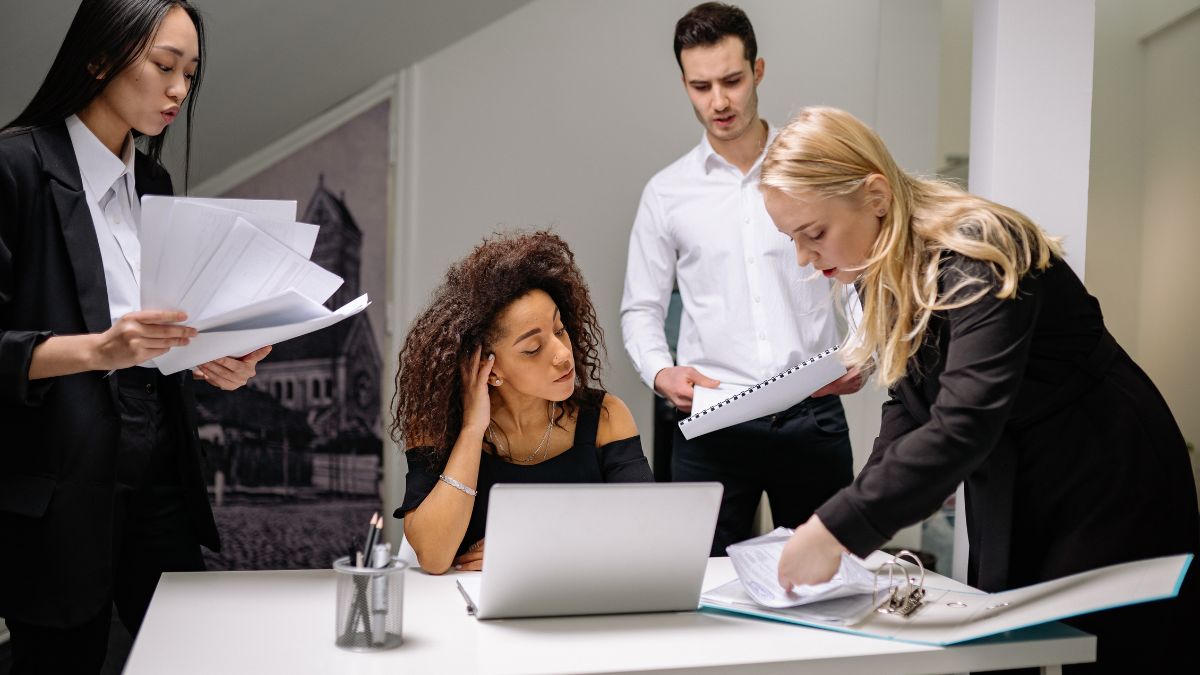 20 Things Toxic Coworkers Do to Secretly Sabotage You Behind Your Back