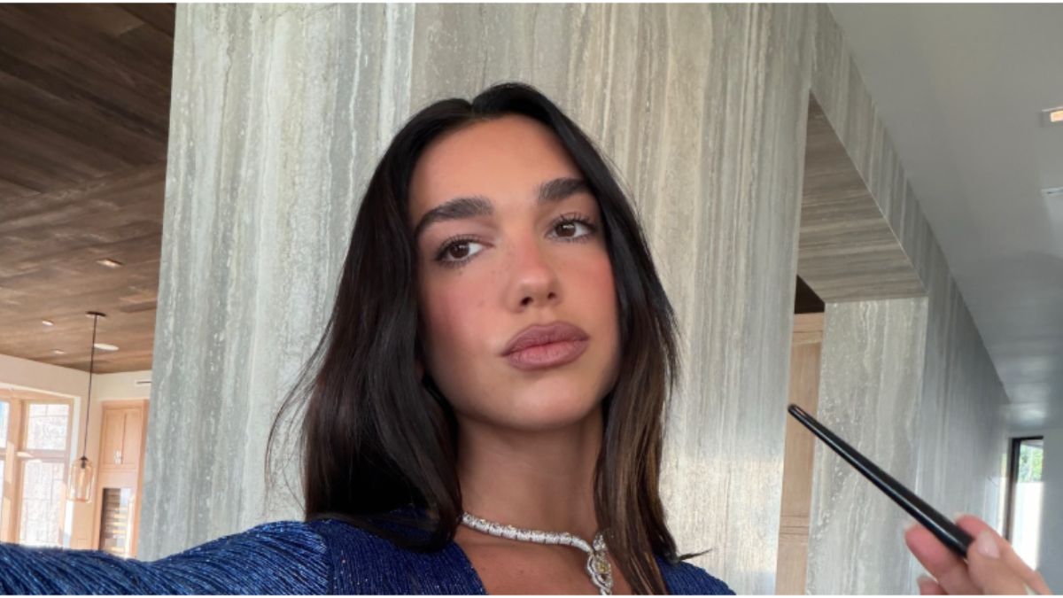 Dua Lipa’s Gold Statement Suit Is The Bold Throwback Look Worth Recreating