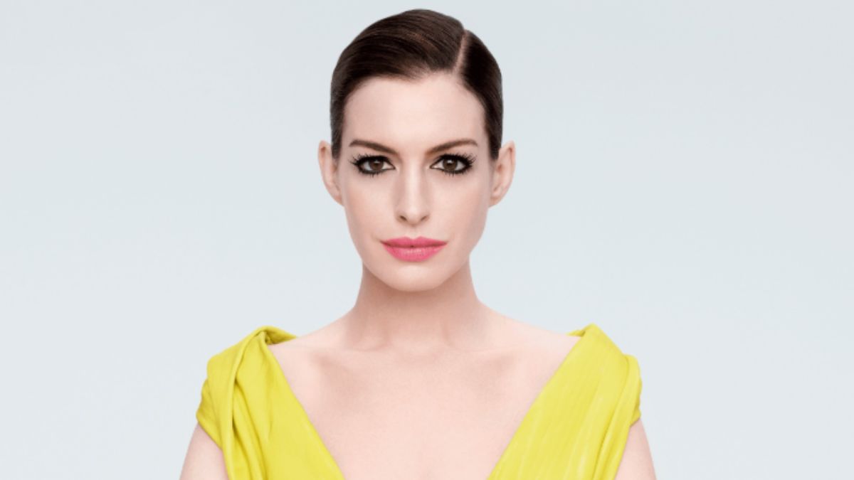 Anne Hathaway’s Bold Yellow Plunge Gown and Red Bra Moment Is the Allure Shoot We’re Still Thinking About