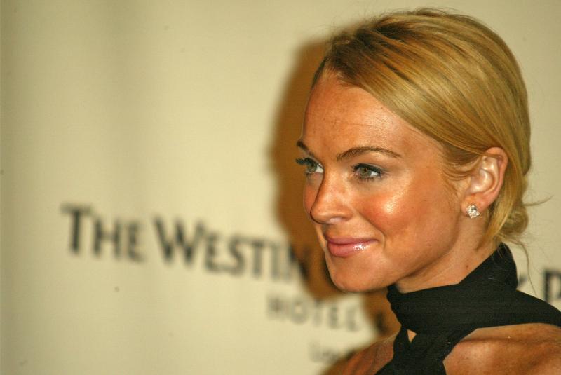 Lindsay Lohan’s Dark Red Vogue Arabia Dress Is Pure Timeless Glamour Must Try