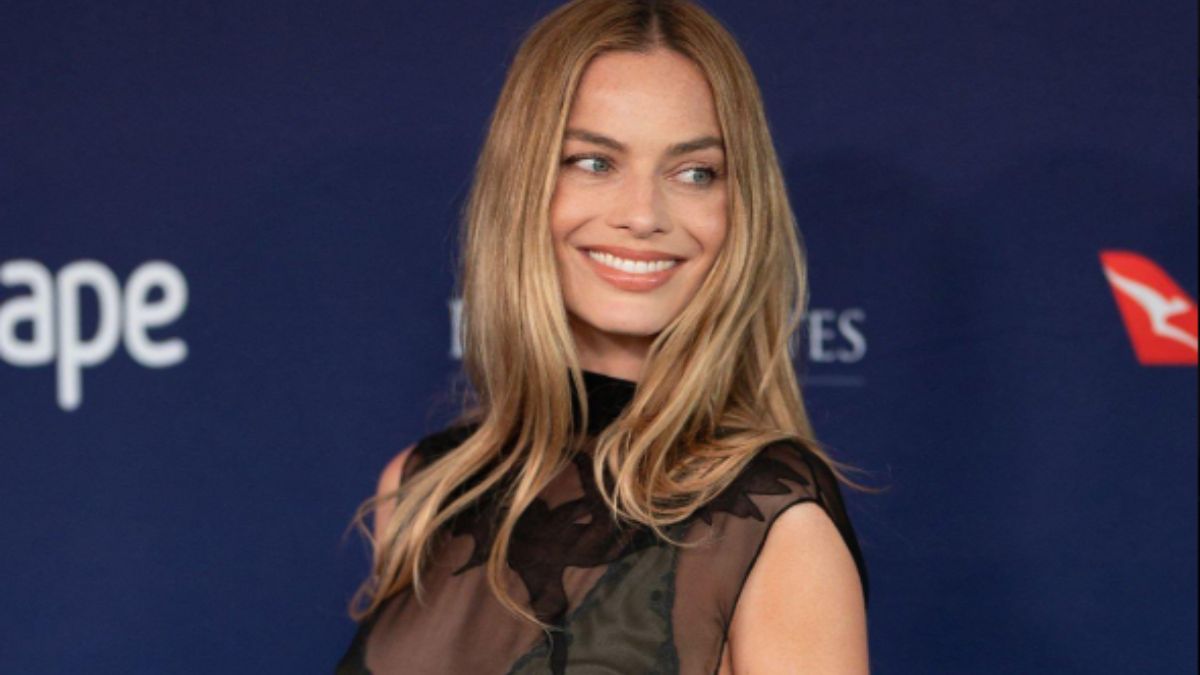 Margot Robbie’s Bold Sheer Ensemble Is the Sydney Summer Look We’re All Copying