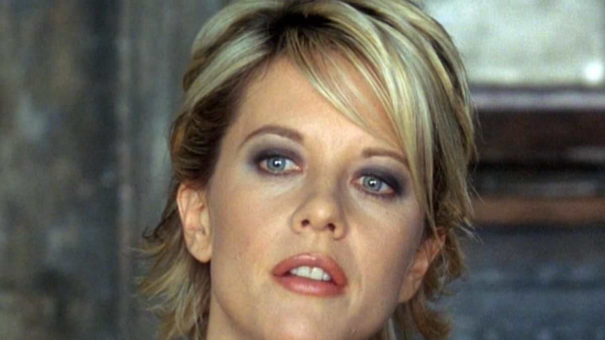 Meg Ryan’s Sleek Satin Green Dress at the Vanity Fair Oscars Party Is a Masterclass in Understated Glamour