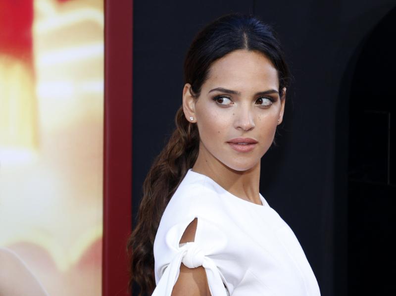 Adria Arjona’s Oversized White Top Delivers Barely-Tamed Balenciaga Glam Done Right